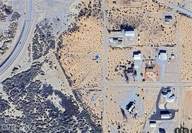 Aerial view of sparsely populated area with a dese