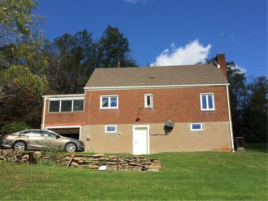 Garage in rear, plenty of parking area for 4 on dr