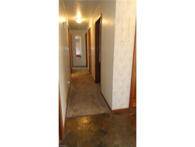 stone foyer-hallway to bedrooms main bath hardwood