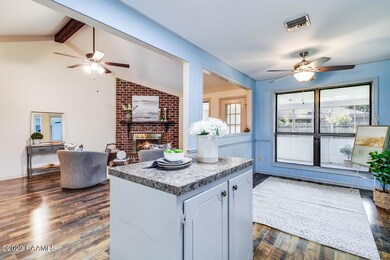 Kitchen open to dining and living