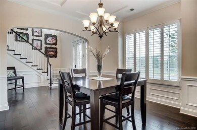 Elegant Arched Entries and Plantation Shutters