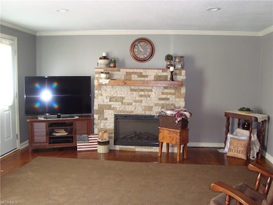 Living room with stone fireplace