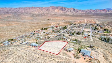 Aerial view featuring a rural view, view of desert