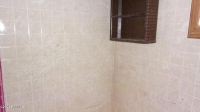 ensuite bath at right