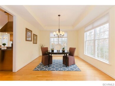 Bright and spacious formal dining room featuring t