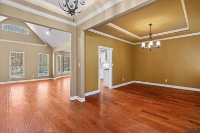 Spare room with hardwood / wood-style floors, a to