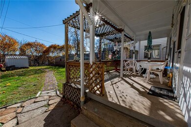 Cute back porch, perfect for outdoor entertaining,