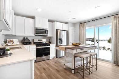 Lots of cabinets and pantry space will ensure that you have plenty of storage options. Photo is of model home. Colors and options may vary. Ask Sales Agent for details.