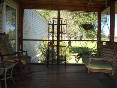 Exterior Front. Screened Front Porch