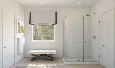 Primary bath with glass shower enclosure