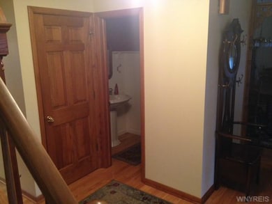 Bathroom Half bath off hallway