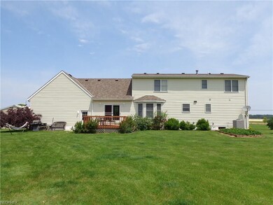 Back view, outside wood deck.