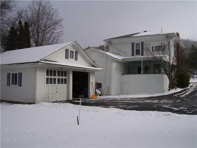Exterior Back Nice big village lot!