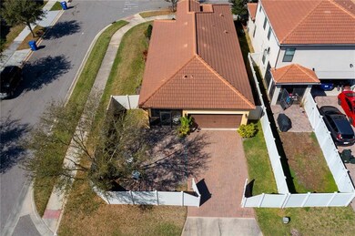 Aerial View of the fenced garage with paved patio
