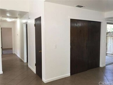 Hallway to the left, washer dryer closet doors to 