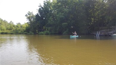 Enjoy paddleboarding, kayaking, and other watersports in this peaceful cove.