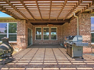 View of terrace featuring a pergola, ceiling fan, 