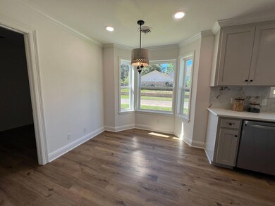 Unfurnished dining area featuring an inviting chan