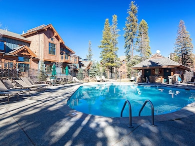 Pool featuring a patio area and fence