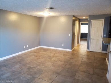Dining room area with accent ceiling light...