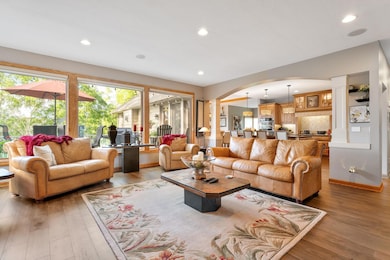 Thoughtfully designed with comfort and style in mind, the living room flows to the adjacent kitchen, dining and other living spaces.