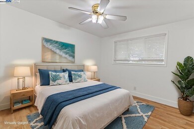 Upstairs bedroom that has be virtual staged