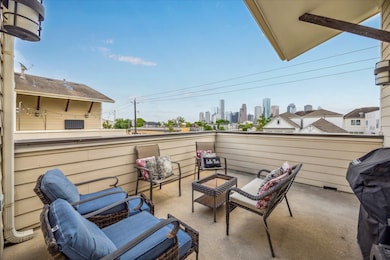 View of this cozy rooftop patio featuring comforta