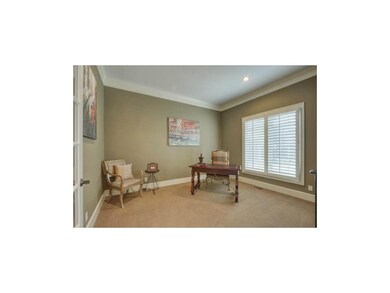 Main floor office w/ french doors.