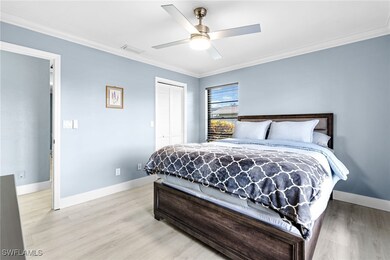 Bedroom with Queen size bed and flatscreen tv