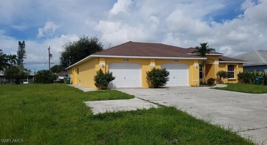 Large driveway & garage.