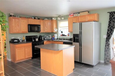 Kitchen with updated tile flooring...
