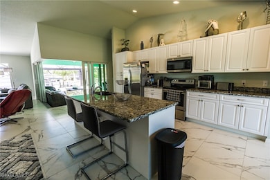 Kitchen with appliances with stainless steel finis