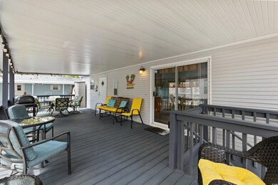 Wooden deck featuring outdoor dining area