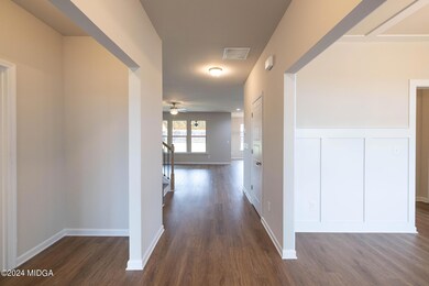 001 The inviting foyer opens up to the f