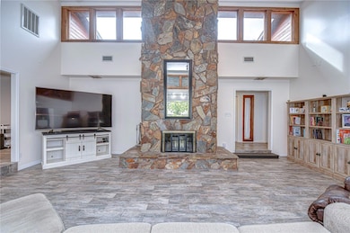 Cozy stone wood-burning fireplace!