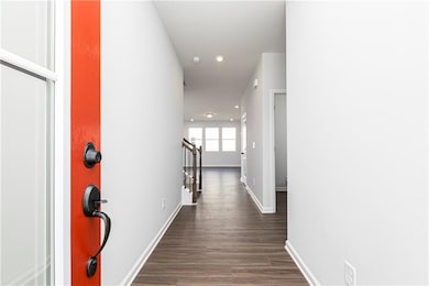 Inviting entryway with high-ceilings and natural l