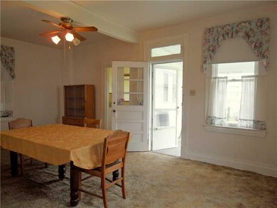 Dining Room. View of Dining Room and Door to Back 