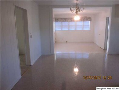 View from dining area in the kitchen to the den/su