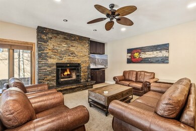 Living room featuring ceiling fan, recessed lighti