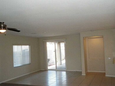 Den. View of Great Room and patio door to covered