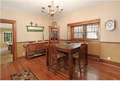Huge dining room with wood floors and 2 delightful