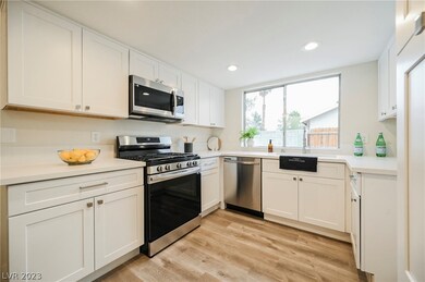 STUNNING kitchen with NEW SHAKER cabinetry, QUARTZ