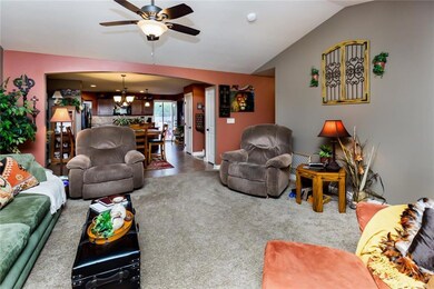 Warm inviting living area open to dinning and kitc