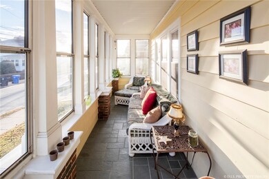 This three-season porch is fully enclosed and has