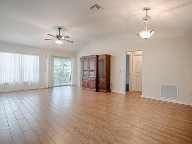 LARGE OPEN LIVING / DINING ROOM WITH SLIDERS TO TH