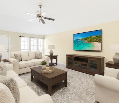 Large living area with plenty of natural light.