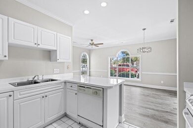 Kitchen with ceiling fan, light hardwood / wood-st
