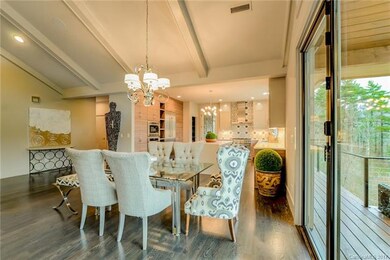 Dining opens to outdoor living area