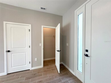 Coat Closet & Inside A/C Unit