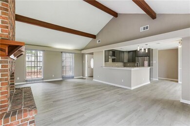 Den open to kitchen